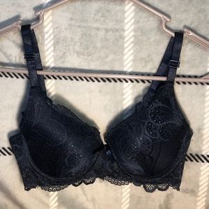Two bras: navy blue and light pink